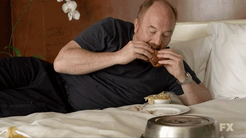 Louie CK Eats on a Bed