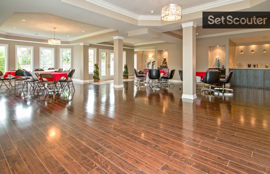 Like a house made for the first family, this one comes with an expansive formal dining area. With a full service bar and glossy hardwood, this space could double as the set of an exclusive club or banquet hall.