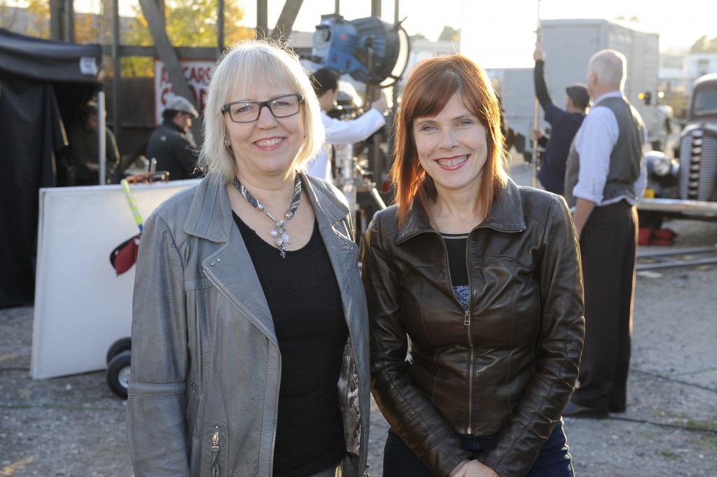 Adrienne on set with her producing partner Janis Lundman.